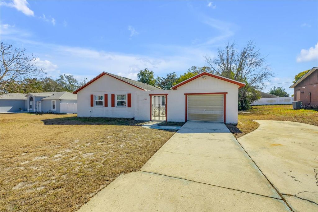 Photo of 1981 S Merrick Drive, Deltona, FL 32738 (MLS # O6381519)