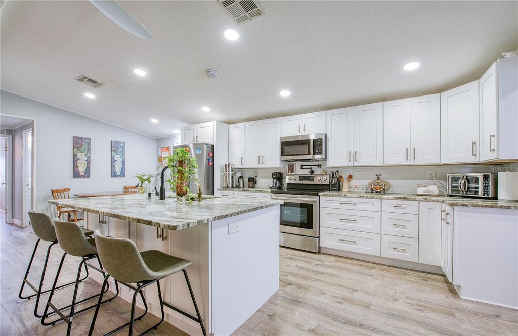 Photo of 417 Dolphin Drive S, Oldsmar, FL 34677 (MLS # TB8504194)
