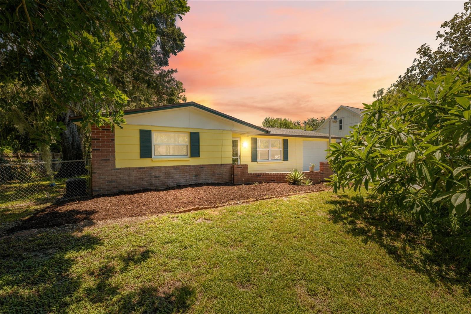 Charming, Updated & Move-In Ready! This 2BR/2BA Port Richey gem offers 1,201 sqft of comfort and style with upgrades galore! Step inside to find brand-new Luxury Vinyl Plank flooring, fresh interior & exterior paint, and hurricane impact windows and doors—even the garage door! Just add roof clips or a third nail to qualify for hurricane mitigation discounts.
Enjoy a spacious family room, two generously sized bedrooms, and an updated main bath with walk-in shower. A second full bath was added, featuring a tub/shower combo—perfect for guests or a growing family. All faucets and toilets replaced in 2025 for added peace of mind.
Step out back to your large, covered and screened patio overlooking a fully fenced backyard with mature oak trees for shade, plumeria blooms in the front, and a lime tree in back. There’s plenty of room for a pool or your dream garden, with reclaimed water available for irrigation.
You'll love the inside laundry room, extended driveway, and proximity to Downtown New Port Richey and Sims Park—perfect for weekend strolls, shopping, and dining. Whether you're a first-time buyer, retiree, or someone in between, this inviting home checks all the boxes for comfort, style, and location. Welcome home!