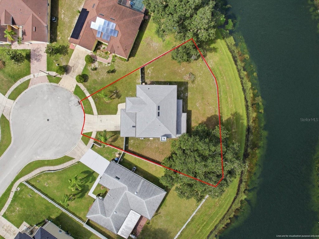 Photo of 207 Redwood Bark Trail, Kissimmee, FL 34758 (MLS # O6448744)