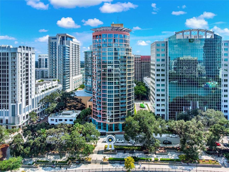 Discover this penthouse-style condominium featuring breathtaking panoramic views of Lake Eola and the stunning Orlando skyline—truly an iconic sight for the city. This is a rare chance to own one of the limited 3-bedroom, 2-bath condos available in downtown Orlando. Nestled in the main tower of the Waverly on Lake Eola, this urban oasis offers over 1,932 square feet of luxurious living space. Flooded with natural light from floor-to-ceiling windows in the living room, dining room, master bedroom, and kitchen, the home leads to an expansive terrace with unobstructed views of Lake Eola—perfect for enjoying fireworks from the comfort of your own space! Recently remodeled, the unit features updated bathrooms, fresh paint, and a new hot water tank. Residents and guests can indulge in a resort-style lifestyle with a variety of amenities on the 5th-floor club level, including 24-hour security, a fitness room, an entertainment area, and a fabulous pool deck with a spa. Convenience is at your doorstep with two parking spaces located on the 3rd floor, just steps from the elevator. Additional storage is available for purchase! This property perfectly blends luxury and practicality, located adjacent to the financial and business district and a short distance to fine dining, shopping, and art galleries. You’re just minutes away from Amway Center, train and bus lines, and quick access to all major highways. Don't miss out on this unique opportunity to live inspired in a supreme residence with iconic views! Schedule your private showing today—this one-of-a-kind property won’t last long!