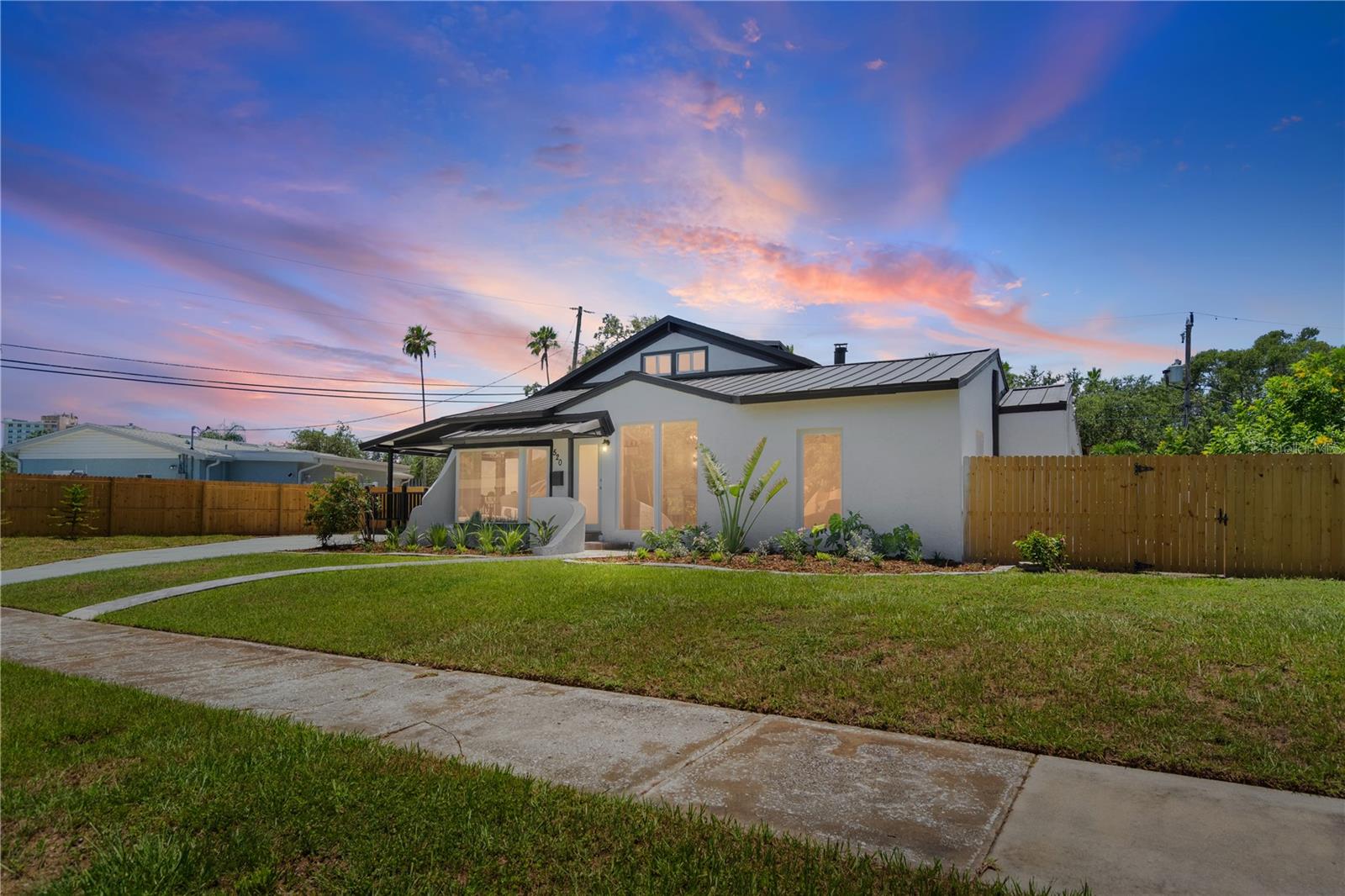 Located in the charming Eagle Crest neighborhood—known for its brick-lined streets, lush landscaping, and nearby lakes—this newly renovated pool home offers exceptional curb appeal and an inviting community atmosphere, perfect for evening strolls and park visits. Offering 4 bedrooms, 3 bathrooms, 1 car garage and 2,546 square feet of thoughtfully designed living space, this home blends charm and functionality with over $200,000 in upgrades and a pre-listing inspection already completed making this home is truly move-in ready! Featuring character-rich architectural details like large ceiling arches, a statement fireplace, and large windows and sliders that open the interior with natural light. The layout strikes a perfect balance—open and airy, yet with distinct spaces for living, dining, and kitchen. The front foyer opens to a spacious covered lanai, perfect for welcoming guests and enjoying front porch living. No detail was overlooked: solid oak flooring throughout, Taj Mahal quartzite countertops, and tile work in the bathrooms that’s truly Pinterest-worthy. Clever built-in features under the stairwell maximize style and function, turning every corner into usable space. Upstairs, the primary suite impresses with vaulted ceilings, a walk-in closet, a spa-like bath featuring a double vanity, soaking tub, beautiful tile work, and a full wall of custom cabinetry for added storage. Lastly, the kitchen includes brand-new Whirlpool appliances, ample drawer space for effortless organization, and a layout that was designed with both style and function in mind. Just off the one-car garage, there’s a super handy mudroom/laundry area with built-in cabinets, counters, and a utility sink. This place is really well done—don’t wait to come check it out!