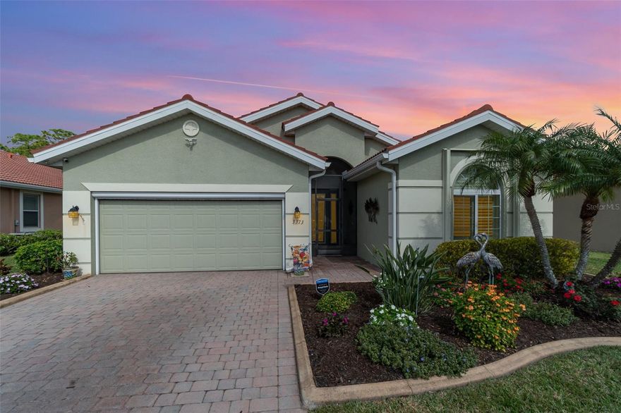 Beautifully updated home sits on the 13th fairway, non flood zone and has been thoughtfully enhanced with a long list of high-quality upgrades. NEW Hayward pool pump, bamboo hardwood floors (NO carpet!), accordion storm shutters for exterior windows and doors, plantation shutters throughout, beautiful etched glass front door with screened entry and a new 80-gallon water heater JUST TO NAME A FEW! Enjoy a sparkling 14'x26' kidney-shaped pool within a massive 40’x41’ screened lanai—perfect for entertaining or relaxing in style ALL YEAR LONG. Step inside and discover crown molding, custom kitchen cabinets with slide-out drawers, designer backsplash, and a high-quality dishwasher less than a year old. The spacious primary bedroom includes a luxurious jacuzzi tub, offering a private spa-like retreat. Additional upgrades include: Culligan reverse osmosis water system (less than two years old), Whole-home electric surge protector at meter (LCEC), Security system with 3 cameras, Exterior & interior freshly painted, cement curbing, Kenmore washer & dryer with drawers, New garage door rods/bearings, attic stairs, Generator hook-up w/ quick disconnect, Devon etched glass front door & screened entry, and recently replaced all lanai screens. Located just a short distance from the Clubhouse, Restaurant, and Golf Course, this home offers PRIVACY with a serene view with trees and golf course. Resort-style amenities at Magnolia Landing include: pool, lap pool, pickleball, bocce, shuffleboard, a fitness center, and daily events. Golf course is optional membership or pay-to-play.
