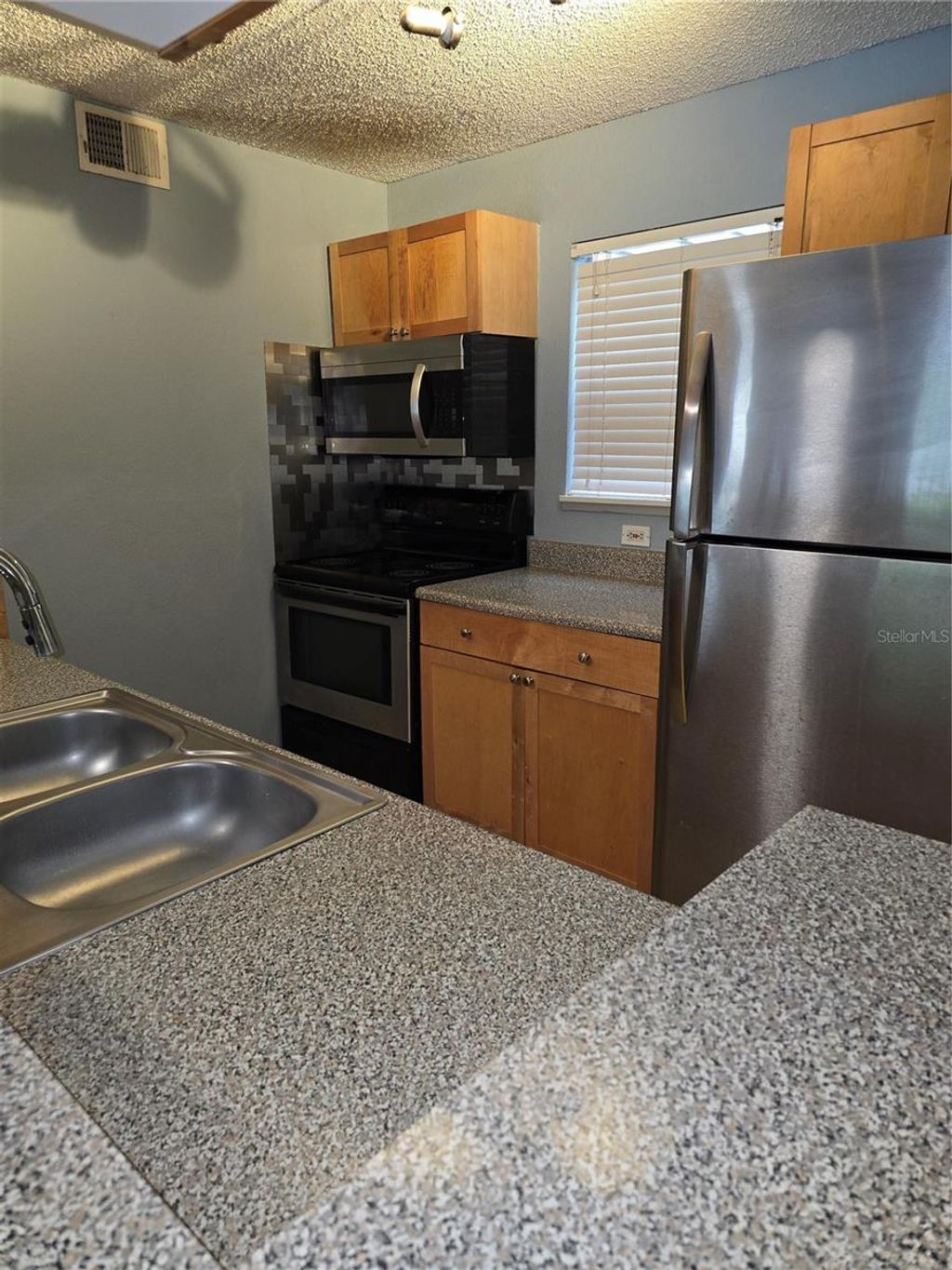 Photo of 2500 Winding Creek Boulevard #E205, Clearwater, FL 33761 (MLS # A4689708)