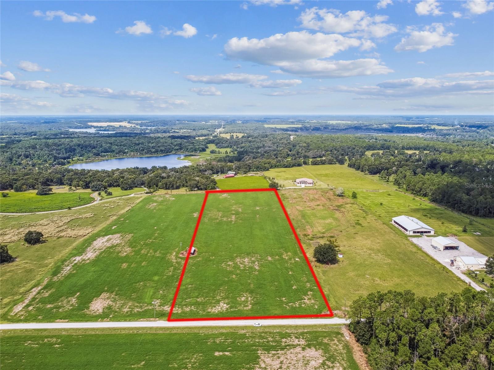 Discover a tranquil escape on this magnificent 10-acre property with gorgeous hilltop views. At nearly 290 feet of elevation this is one of the highest points in the area. Conveniently located just minutes from I-75, this expansive tract of land feels like a world away from the hussle and bustle of the city. The property is a haven for nature, featuring a diverse landscape of rolling hills and secluded location off of Blanton Rd. This land is a blank slate, offering endless opportunities to build a private estate, a family getaway, or a nature-filled retreat. It's the ideal place to create your own sanctuary and enjoy the peace and quiet of the outdoors.
There are two old non functioning wells at the perimeter of the property. The parcel is currently a hay field withTifton 44 Bermuda grass.
Listing broker is owner.