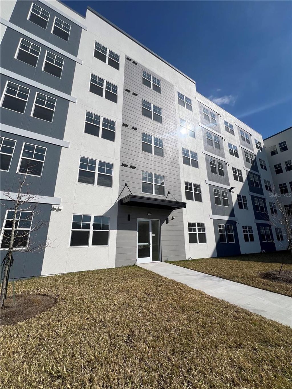 Photo of 5592 Millenia Park Boulevard #214, Orlando, FL 32839 (MLS # O6383795)