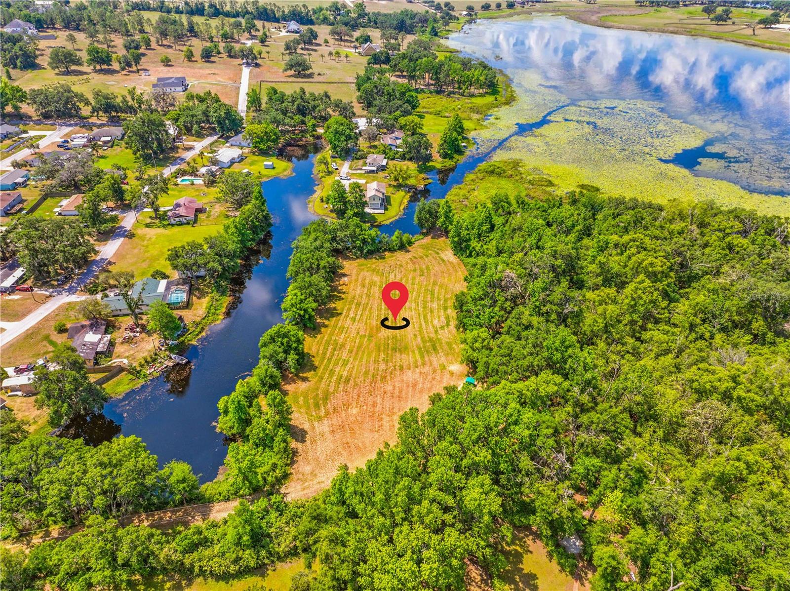 **Rare Opportunity in Pasadena Shores!**
Welcome to your own slice of Florida paradise! This **1.8-acre cleared property** offers a stunning **canal-front setting with direct access to Lake Pasadena**—plus a beautiful view of the lake right from your future homesite. Located in the peaceful **Pasadena Shores subdivision**, this unique property includes **4 separate lots**, giving you flexibility to **build one spacious dream home or up to four individual homes**.
A **brand new 100-foot well** is already in place, saving you time and money as you get ready to build. With **no HOA**, you'll enjoy freedom and flexibility to make this land truly your own. Whether you're dreaming of a private estate or considering investment opportunities, this property has all the potential you're looking for.
Don’t miss out—canal-front lots with this much space and versatility are a rare find!