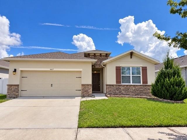 Photo of 1437 Tawny Ridge Road, Kissimmee, FL 34744 (MLS # S5158642)