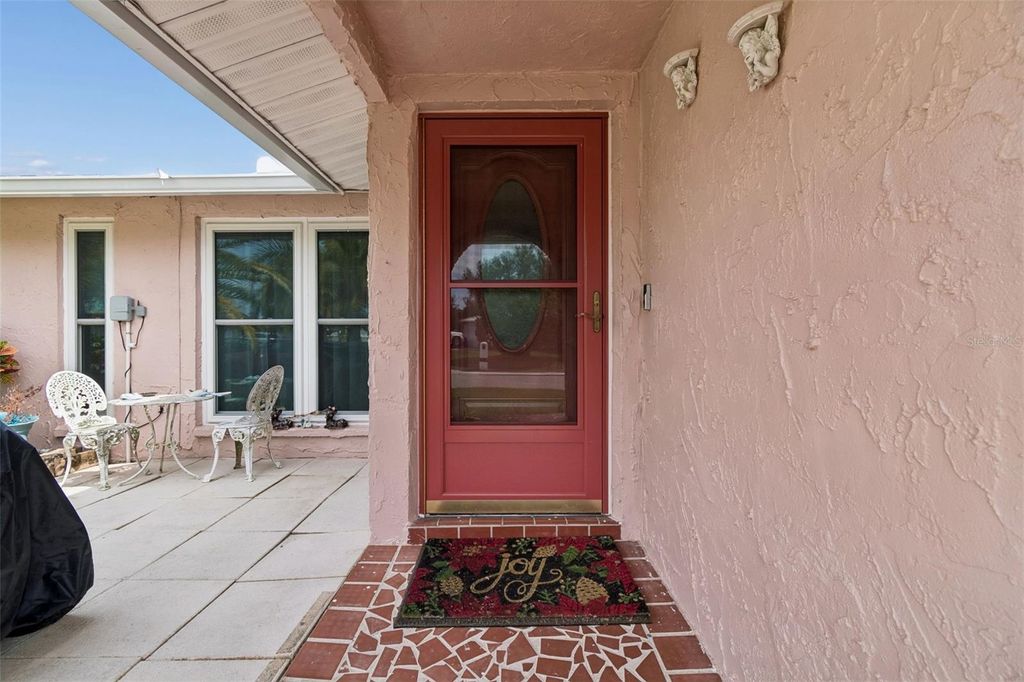 Photo of 9252 Glen Moor Lane, Port Richey, FL 34668 (MLS # TB8505037)