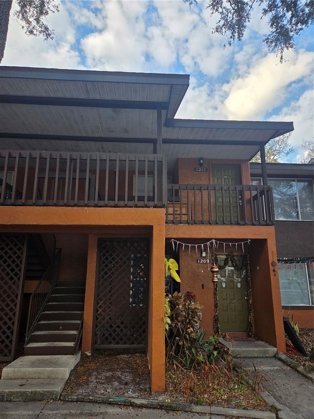 Photo of 1211 Sago Palm Boulevard #1211, Kissimmee, FL 34741 (MLS # S5143899)