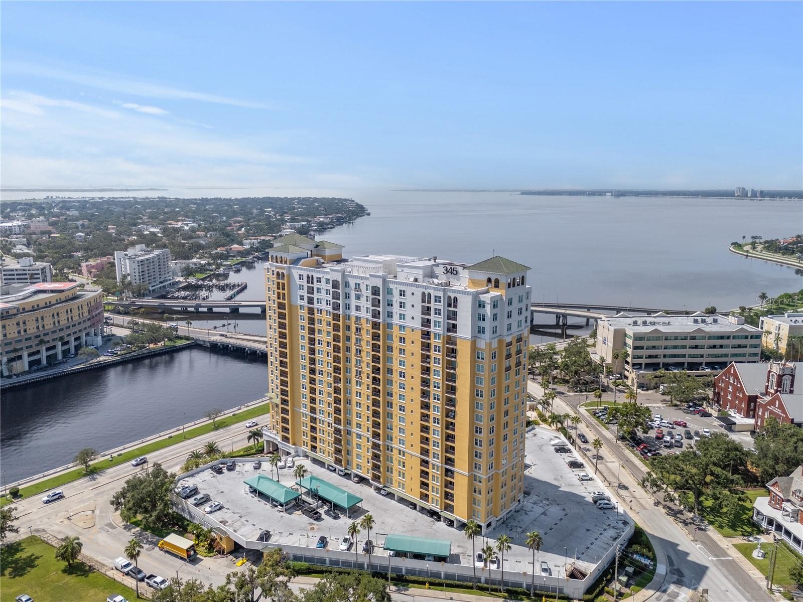 MAGNIFICENT WATER VIEWS OF THE BAY from the 18th floor Balcony and every room in this unit. Welcome to the elevated high-rise living at 345 Bayshore, one of Tampa's most iconic waterfront addresses where luxury living and spectacular water views come together on one of the nation's longest continuous sidewalk at 4.5 miles of waterfront and open bay beauty, Bayshore Boulevard. This upgraded, spacious and freshly painted unit with travertine flooring throughout offers a unique and open concept living space where floor-to-ceiling windows showcase the views and brighten the unit with natural light and bay breezes. This unit's layout is unique, offering a larger kitchen with a floor to ceiling mirror and granite countertops and a spacious living room. The primary suite is large enough for a king-sized bed and featuring a custom walk-in closet. The en-suite bath is pure luxury, with granite countertop and wood vanity, a walk-in glass shower, and porcelain tile finishes on floor and walls that feel like a spa retreat. The split floor plan offers privacy and function- a spacious guest bedroom showcasing breath-taking water views of the bay, French double doors that can change the functionality of the room and be used as a formal dining room, media room, office or a bedroom with a walk-in closet and an upgraded bathroom featuring a deep soaking tub and walls covered in porcelain tile. Washer and dryer included in the unit. This luxury high-rise building with its porte-cochere entrance, inviting lobby of marbled floors and dark wood offers a resort-style amenities including 24/7 concierge and security service, a private climate-controlled wine cellar, a stunning library, a recently renovated resort-style pool with fountains and luxe stone pavers, a SPA and sauna, two state of the art fitness centers, outdoor grills and social spaces, business center, club room with Wi-Fi, an elegant conference room with monitor and speakerphone, an EV charging stations, a car wash area, a storage for bicycles as well as paddle boards and kayaks, a private laundry room with front-load washer/dryer and custom storage, and exclusive access to two on-site guest suites for visiting friends or family. Best location- Steps from 345 takes you to all the restaurants, shops, attractions, activities and events in Hyde Park, Davis Islands, Harbor Island, Water Street, Sparkman Wharf, Channelside, the River Walk, the University of Tampa, Armature Works and a dynamic downtown. The building is also near top-rated schools (Gorrie Elementary, Wilson Middle School and Plant High) and Tampa General Hospital, and there's easy access to the Selmon Crosstown Expressway and I-275. Experience Florida luxury lifestyle at its finest. Additional Services included are water, sewer, trash, pest control & exterior window washing. Pets are welcome.