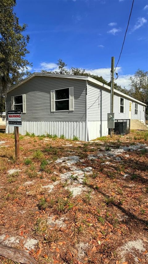 Photo of 1910 40th Street NW, Winter Haven, FL 33881 (MLS # P4938070)