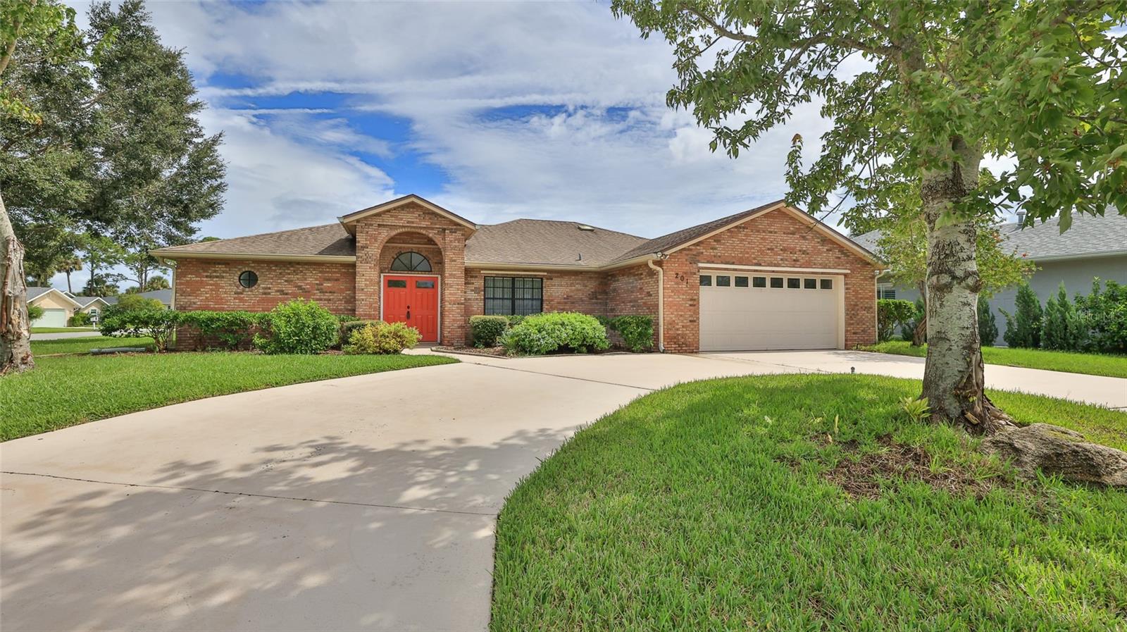 Outstanding, Real Brick over Concrete Block construction home on tranquil pond in quiet golf community awaits you! Split-Bedroom plan and Open Floor Plan with vaulted ceiling and separate Florida Room under the main roof of home. BRAND NEW Kitchen Appliances and 2022 A/C system. 2015 roof has plenty of life left . Spacious waterfront Breakfast Nook off of kitchen area, A/C laundry room, storm shutter system, double pane windows, attic fan, and the hall bath with access to rear yard are but a few of this home's offerings. Primary bedroom has walk-in closet and ensuite bath that features twin sinks, garden tub and separate shower. Nice high, corner lot features sweeping circular drive. Hurricane Ian did not impact this home, at all, not even water on the street. Nestled between 2 golf courses in theis golf-cart-friendly community, and a heated, community pool is available by optional membership and purchase of a pool certificate. Central location is close to everything - Historic Canal Street shopping, dining and art galleries, as well as eclectic Flagler Avenue and the beach are but a short drive away. Affordable HOA annual dues of $350. A great neighborhood to walk, jog or ride your bike, make it your home!