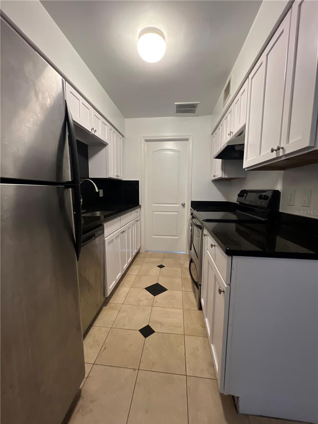 Photo of 517 S Hyer Ave #1, Orlando, FL 32801 (MLS # O6409282)