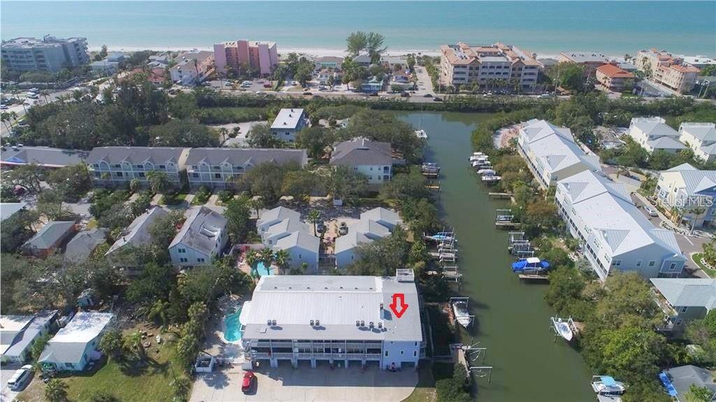 Waterfront Townhome just 2 blocks from the beach!
This beautifully updated and spacious end-unit townhome offers stunning water views from every room. High ceilings and abundant natural light create an open, airy feel throughout.
The updated kitchen features granite countertops, stainless steel appliances, wood cabinetry, and a breakfast bar—perfect for entertaining. Additional highlights include gorgeous tile flooring, a real wood staircase, hurricane-rated windows, a 14-foot living room slider, updated bathrooms, and a versatile home office/bonus room.
Enjoy Florida living outdoors with a large main-floor balcony plus two upstairs balconies off each bedroom. The community features a pool, dock, and an optional boat slip with a lift accommodating up to 12,000 lbs, available for just $295 per month.
All this just steps from the beach and popular spots like Crabby Bill’s, along with grocery stores, shopping, and more! Schedule your private showing today.