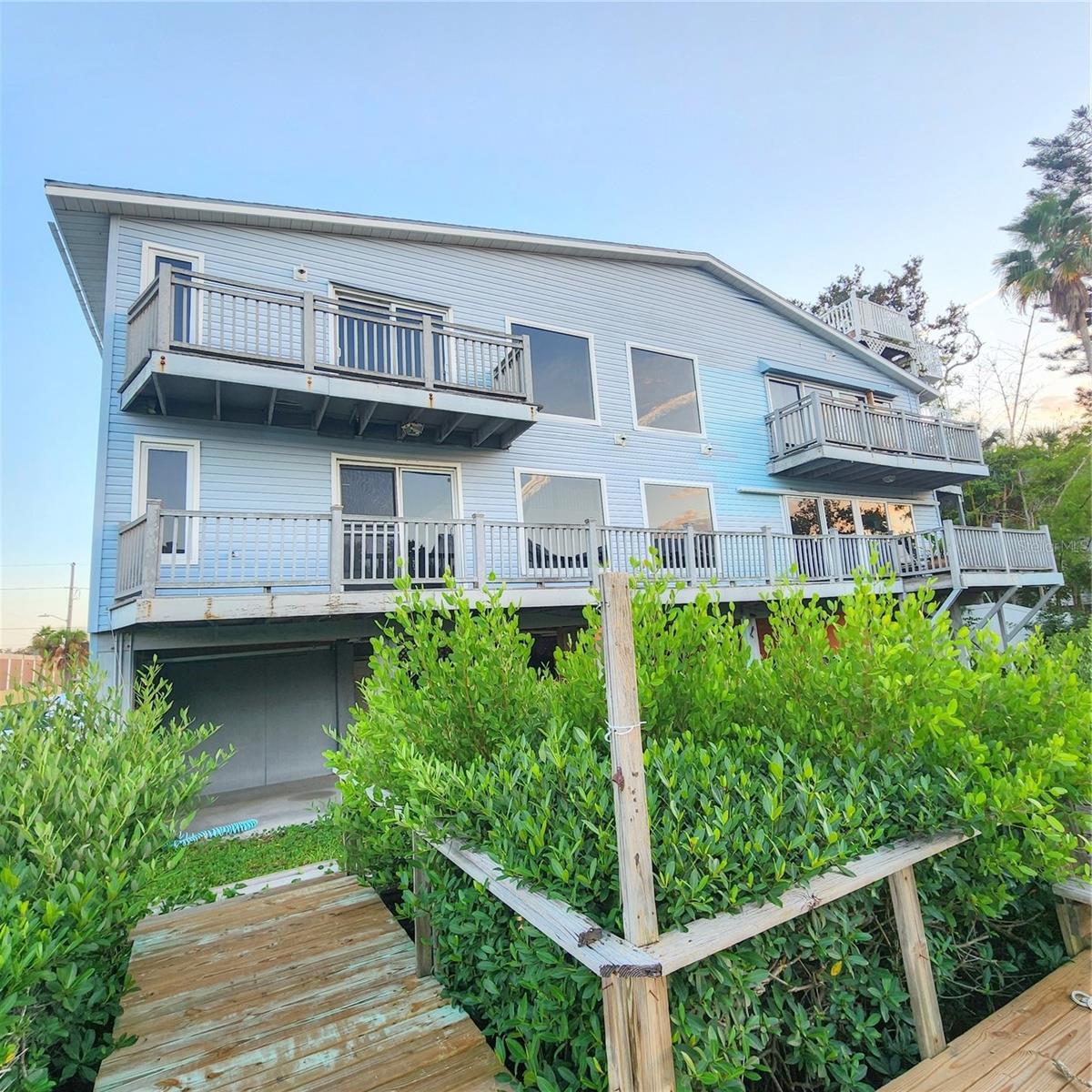 Waterfront Townhome just 2 blocks from the beach!
This beautifully updated and spacious end-unit townhome offers stunning water views from every room. High ceilings and abundant natural light create an open, airy feel throughout.
The updated kitchen features granite countertops, stainless steel appliances, wood cabinetry, and a breakfast bar—perfect for entertaining. Additional highlights include gorgeous tile flooring, a real wood staircase, hurricane-rated windows, a 14-foot living room slider, updated bathrooms, and a versatile home office/bonus room.
Enjoy Florida living outdoors with a large main-floor balcony plus two upstairs balconies off each bedroom. The community features a pool, dock, and an optional boat slip with a lift accommodating up to 12,000 lbs, available for just $295 per month.
All this just steps from the beach and popular spots like Crabby Bill’s, along with grocery stores, shopping, and more! Schedule your private showing today.