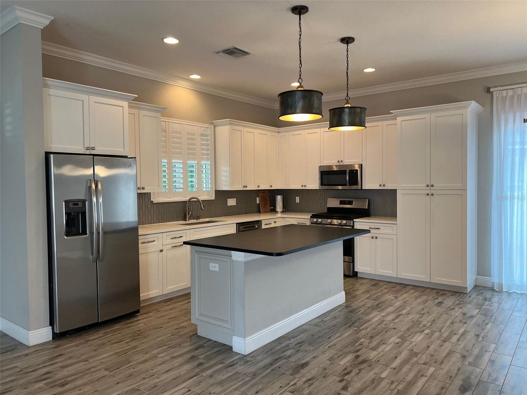 Photo of 590 Rivercrest Lane, Tarpon Springs, FL 34689 (MLS # TB8438810)