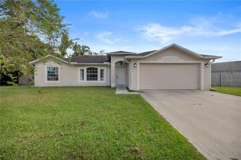 Photo of 62 Presidential Lane, Palm Coast, FL 32164 (MLS # FC312830) Photo of 62 Presidential Lane, Palm Coast, FL 32164 (MLS # FC312830)