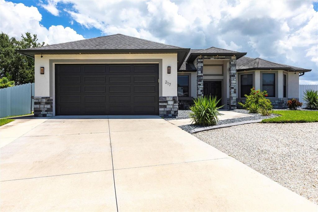 Photo of 217 SW 10th Place, Cape Coral, FL 33991 (MLS # TB8416885)