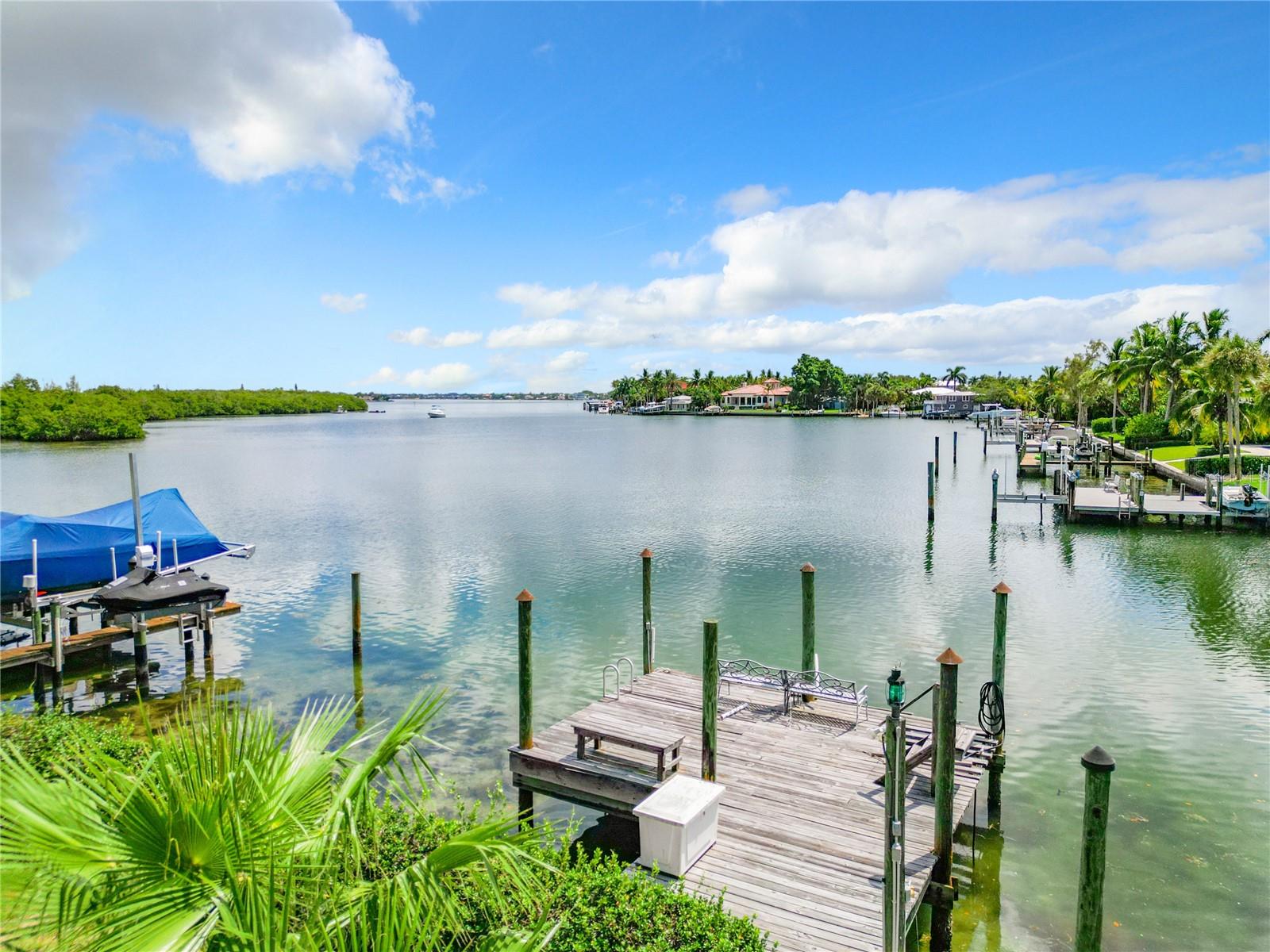 With access to the Gulf of Mexico and the Intracoastal Waterway, boating and dock are conveniently right out your back door. Sited on .73 of an acre (31,898 SF) with 93’ of waterfront, located on the corner of historic S Washington and Tremont, the location offers a deep water basin, Lido Key’s 2.5 miles of white sandy beach on the Gulf of Mexico, and famous St Armands Circle for entertainment. The location and lot size are outstanding. Tremont Lane is a private road for this 5 home small community. The house is 6978 SF, 2 stories, built in 1990 with large rooms, high ceilings, swimming pool and patios. It needs TLC or a new start. Either way, the waterfront location is exciting offering beach, boating, and the shopping/ dining experiences of St. Armands Circle. Sold AS IS, cash only.
