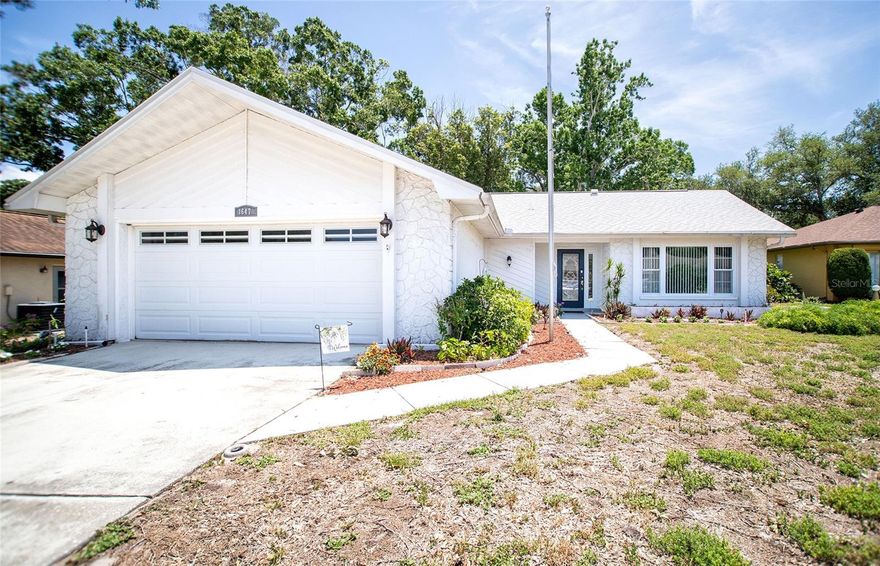 This updated home has just under 2000 square feet of heated/a/c space when the 280sf bonus/Florida Room is added to the base area square footage.  Recent updates include roof replaced in 2023, heat and air in 2019, windows updated in 2009 to energy efficient windows in main living area, electric panel updated in 2019.  Vinyl flooring in light grey/beige tones added in 2020.  This home features a private living room with adjacent dining room and the kitchen features stainless appliances and adjacent eat-in area.  The large family room is off kitchen and could have space for an office or another dining area.  The large 2nd bedroom has a reach in closet while the master bedroom has a walk-in closet.  Both baths have been updated and have granite vanity tops.  The large bonus/Florida room off the family room could be a 3rd bedroom, office or den.  The home has reclaimed water for irrigation but prior tenant  disconnected so the Seller is offering an allowance to re-sod.