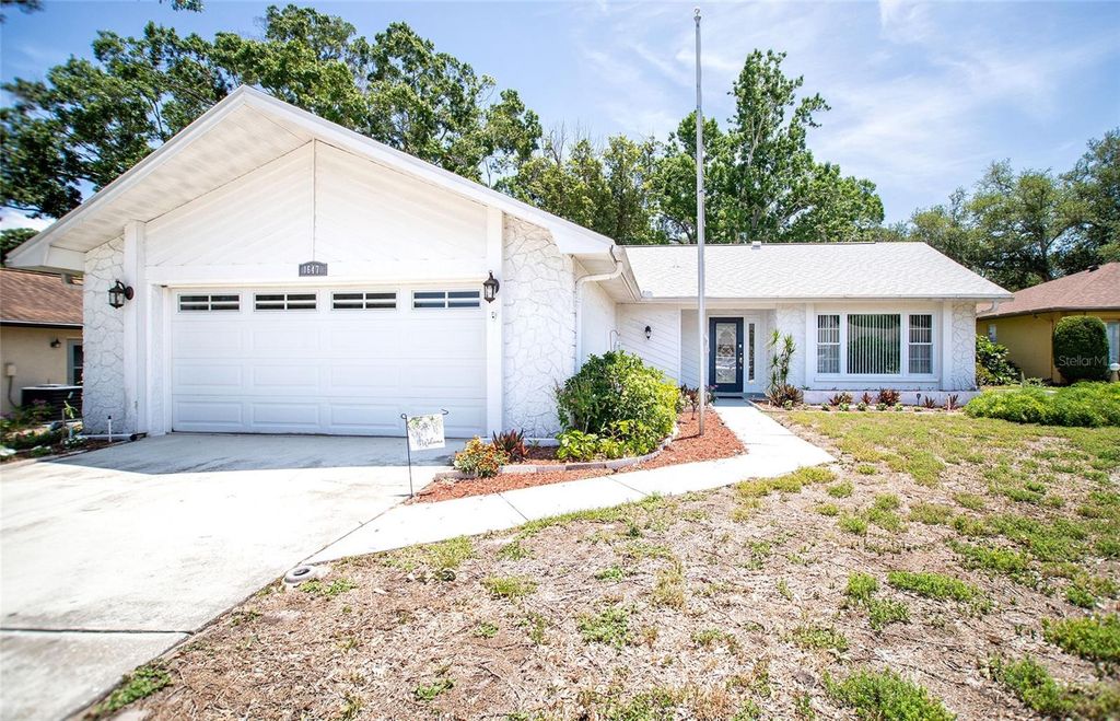Photo of 1647 Bentley Court, Palm Harbor, FL 34684 (MLS # TB8510446)