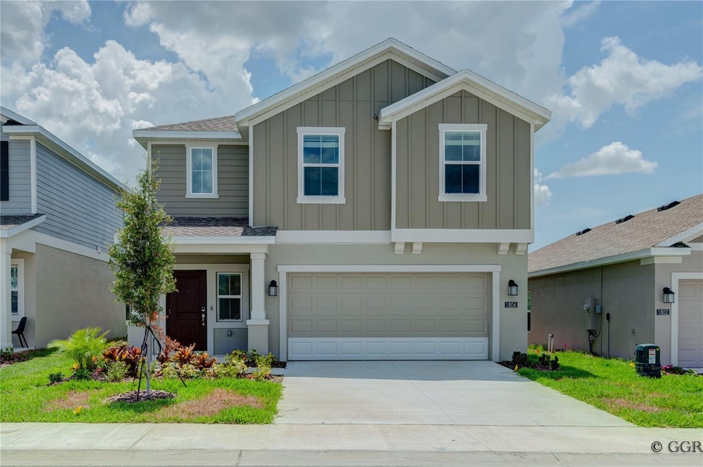 Photo of 1806 Weir Boulevard, Davenport, FL 33837 (MLS # O6432692)