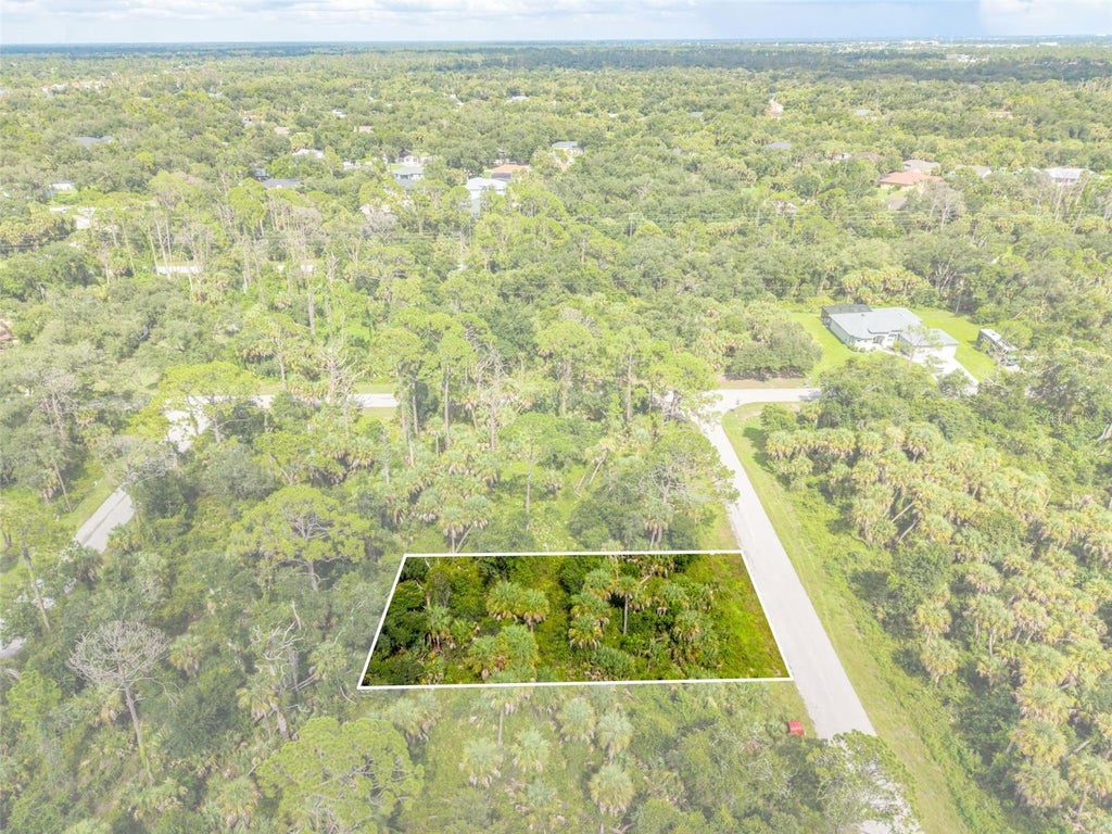 Photo of 16126 Tarkio Avenue, Port Charlotte, FL 33954 (MLS # C7529225)