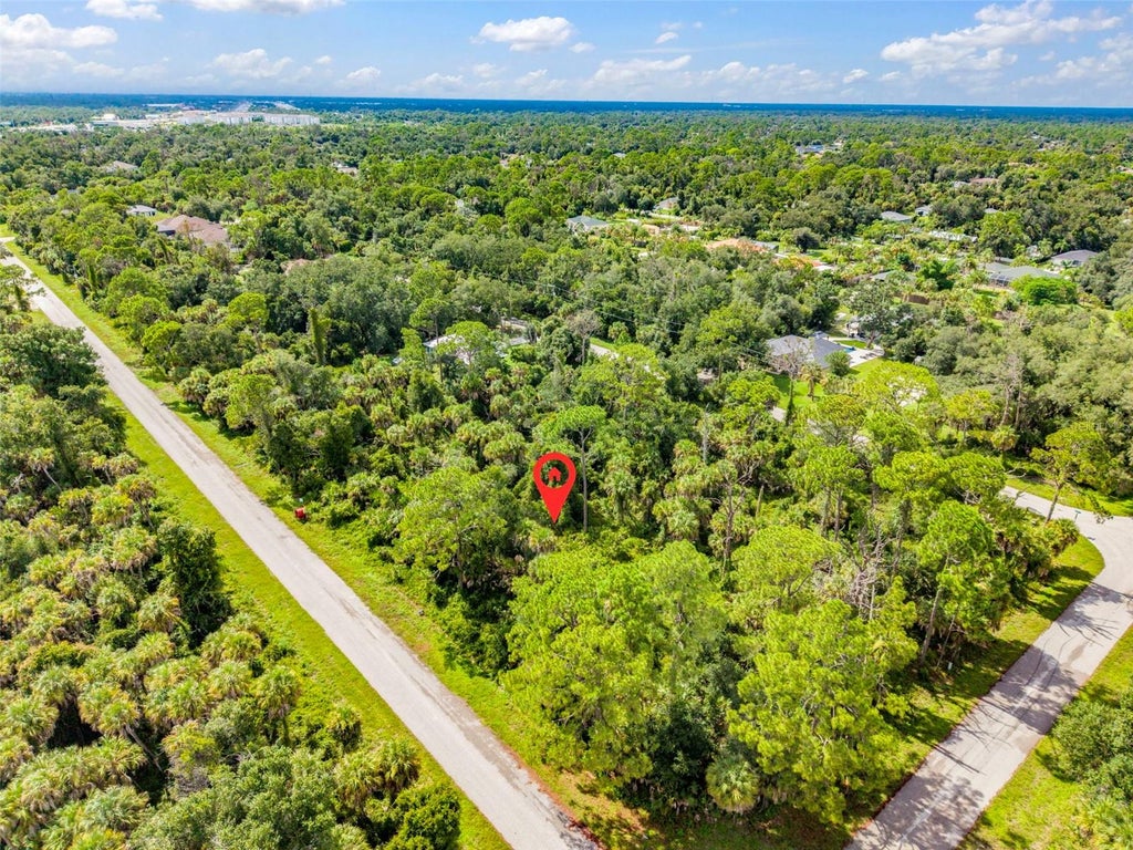 Photo of 16126 Tarkio Avenue, Port Charlotte, FL 33954 (MLS # C7529225)