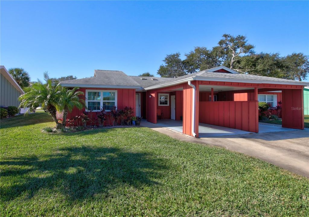 Photo of 1147 Harbour Point Drive, Port Orange, FL 32127 (MLS # O6374704)