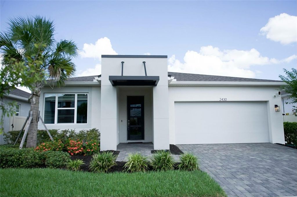 Photo of 2430 Morninglight Drive, Lutz, FL 33558 (MLS # TB8306545)