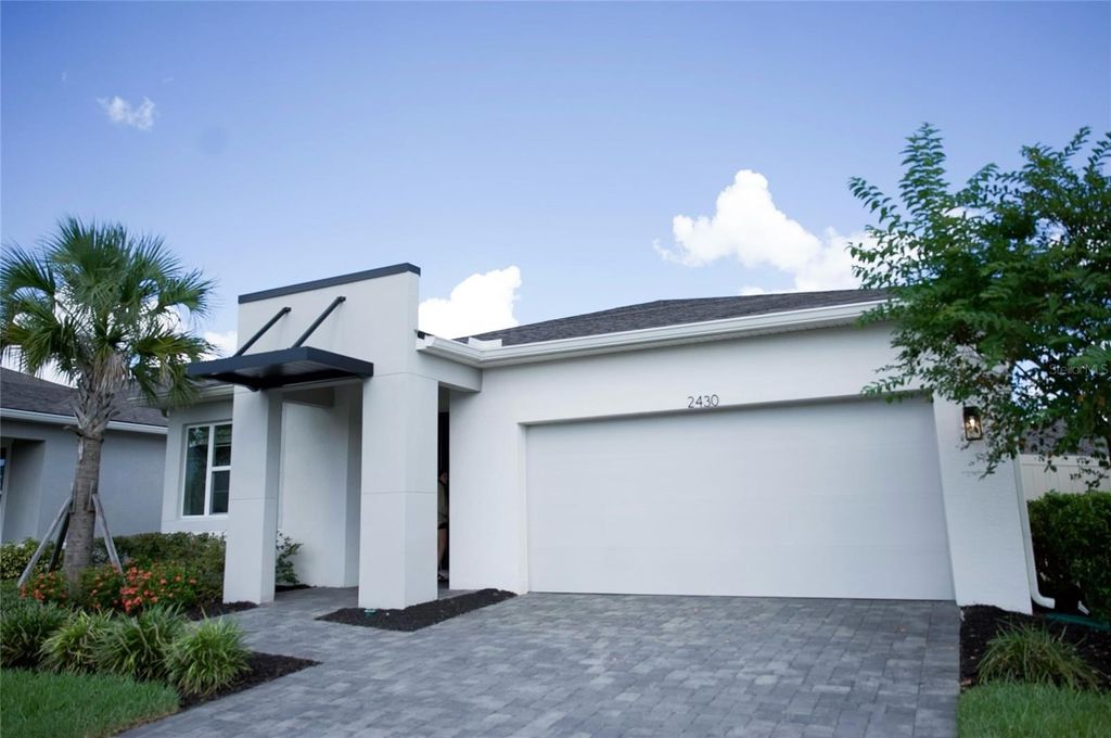 Photo of 2430 Morninglight Drive, Lutz, FL 33558 (MLS # TB8306545)