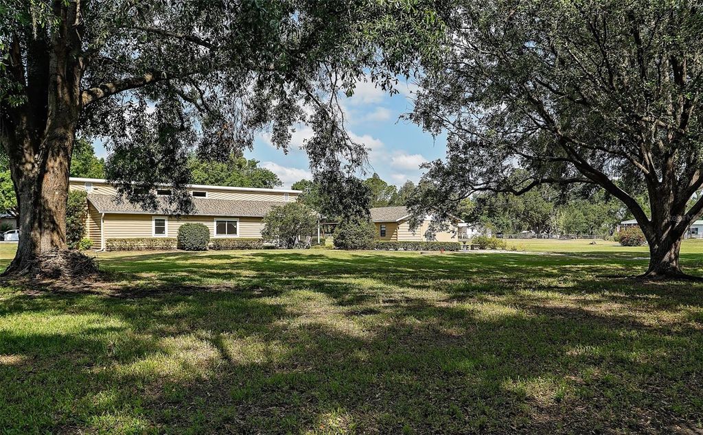 Photo of 7721 Forest Way, Lakeland, FL 33810 (MLS # L4952712)