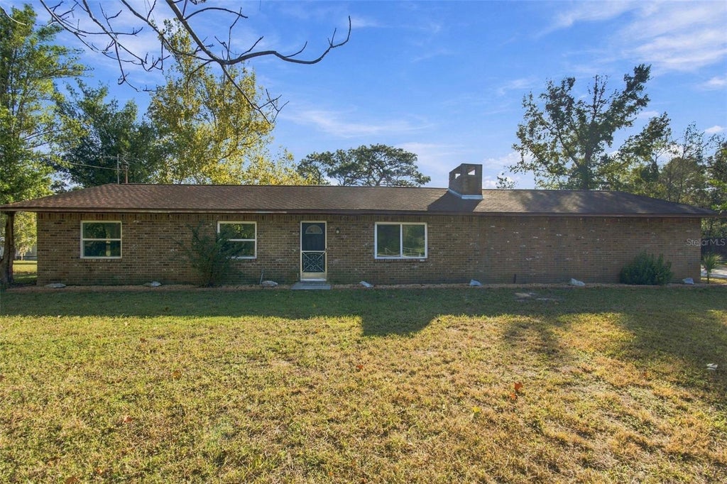 Photo of 12224 Dry Creek Ranch Road, Brooksville, FL 34614 (MLS # TB8559901)