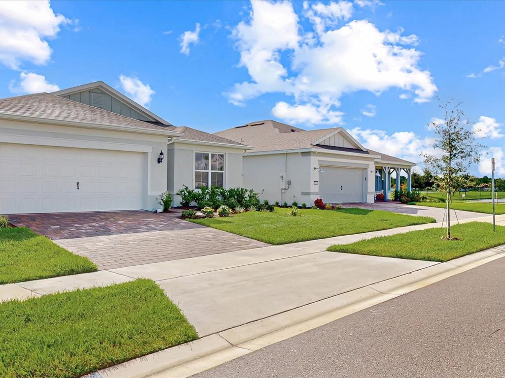 Photo of 6354 Shimmering Shores Lane, Saint Cloud, FL 34771 (MLS # O6388693)