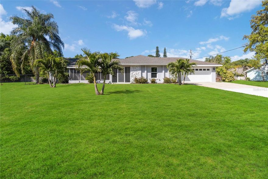 DESIREABLE DOUBLE LOT HOME!!! Welcome to this well-maintained 4-bedroom, 2-bath home located in the heart of North Merritt Island on a spacious lot. This split floor plan offers vaulted ceilings and an open living area filled with natural light, thanks to impact-rated windows and hurricane sliders installed in 2017. A convenient wet bar enhances the living space, perfect for entertaining. Step outside to an open-air patio and a large pool—ideal for relaxing or hosting guests. The property also features a 2017-installed septic system, a 2-car garage with ample room for a workbench and extra storage, and a whole-house Generac generator for peace of mind. This home has been thoughtfully upgraded and lovingly maintained—a true gem in a sought-after neighborhood. Premium Home Warranty included!