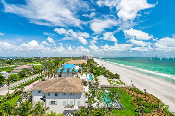 Welcome to your elevated coastal retreat on Longboat Key, located behind the gate of the prestigious Longboat Key Club. Available annually at $9,000/month or seasonally from November through April at $11,500/month, this fully renovated upper-floor residence offers refined living with sweeping Gulf and Bay views from two private balconies. Set within one of the island’s most exclusive beachfront communities, this spacious two-bedroom, two-bathroom condo has been thoughtfully designed and professionally furnished to deliver a seamless blend of coastal elegance and everyday comfort. Sunlight floods the open-concept living and dining areas, where floor-to-ceiling sliders invite you to step outside and enjoy panoramic water views and soft Gulf breezes. The kitchen is outfitted with sleek countertops, high-end cabinetry, and modern stainless steel appliances, fully equipped for both everyday use and entertaining. Each bedroom serves as a luxurious private suite, complete with king-size beds, plush linens, and dedicated bathrooms. The primary suite offers a spa-style bath with a walk-in glass shower and designer finishes, creating the feel of a high-end hotel in the comfort of your own home. Enjoy morning coffee or sunset cocktails from either of the two private balconies, both offering spectacular water views and the serene ambiance of beachfront living. As a resident, you’ll have access to a suite of premier amenities, including private beach access with complimentary chairs and umbrellas, a heated pool and hot tub, lighted tennis courts, a state-of-the-art fitness center, BBQ grills with outdoor dining areas, and an air-conditioned clubhouse. The community is secured with a 24-hour guarded gate and offers concierge-like service for ultimate peace of mind. Ideally located walking distance to Longboat Key Club - just minutes from the upscale shopping, fine dining, and cultural experiences of St. Armands Circle and downtown Sarasota, and with easy access to Sarasota-Bradenton International Airport, this residence offers a rare opportunity to enjoy the very best of Longboat Key living—whether for the season or year-round. Luxury, privacy, and breathtaking views await.