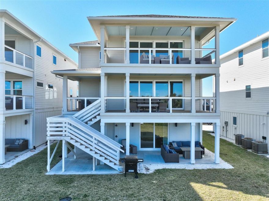 BEST DEAL ON THE BEACH! Direct Oceanfront Luxury Home with Private Beach Walkover – Turnkey and Fully Furnished!

This stunning 5-bedroom, 5-bathroom oceanfront residence offers the ultimate in coastal living and luxury. Fully furnished with high-end finishes and designer touches throughout, this turnkey property features a private elevator, making access to every level effortless.

Perched high and dry, this home offers breathtaking panoramic ocean views and ample room to add a pool. Enjoy 800 square feet of covered porch space—perfect for outdoor entertaining or simply relaxing to the sound of the waves.

The chef’s kitchen is outfitted with premium appliances, including a Wolf range, and each bathroom is beautifully appointed with upscale fixtures. Additional features include instant hot water, a private beach walkover, and direct beach access—just steps from your door.

Located within an exclusive oceanfront community, amenities include:

Three clubhouses

Two swimming pools

Fishing dock

Scenic walking trails

Small boat storage

This home is not only a spectacular private retreat, but also a proven high-end rental property with strong income history.

Conveniently located near top local attractions such as Matanzas Inlet, Marineland, Washington Oaks State Park, and a wide variety of dining and entertainment options, this home offers both tranquility and accessibility.

Whether you're seeking a lucrative investment or your own piece of paradise, this property is a rare oceanfront gem that combines elegance, comfort, and the best of Florida’s coastal lifestyle.