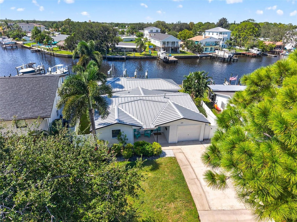 Photo of 209 Tallahassee Drive NE, St Petersburg, FL 33702 (MLS # TB8547827)