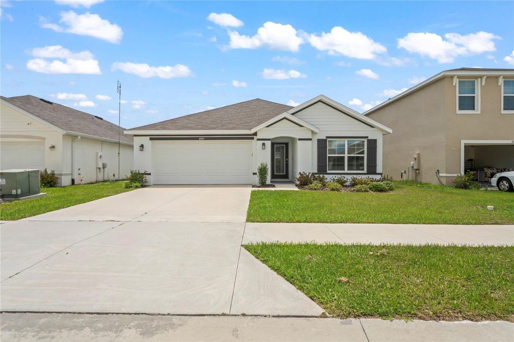 Photo of 4041 Autumn Amber Dr, Spring Hill, FL 34609 (MLS # W7877519)