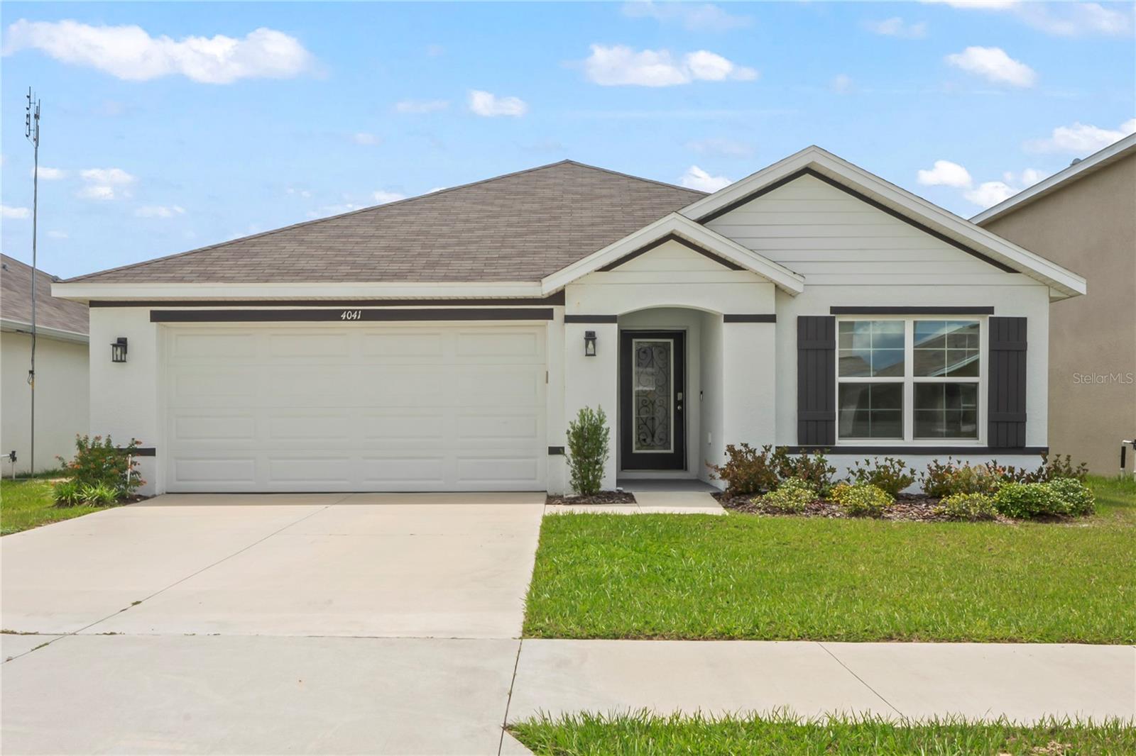Highly Sought After Prime Location - The Barrington at Sterling Hill, a gated, walkable community with many modern amenities. Built in 2022, 4041 Autumn Amber offers 3/2/2 with 1672 sq. ft. of thoughtfully designed modern living space. Cheerful, pleasantly light and bright, meticulously clean and exceptionally maintained ready for you to Move in! The Curb appeal is heightened by the beautifully Upgraded Custom Front door allowing natural light to flow through the home. Step through the spacious foyer, you are immediately invited into the Open living space with tasteful, neutral tile flooring that flows seamlessly throughout the main areas. The well-appointed Kitchen - the heart of the home - boasts sleek Granite countertops, Farmhouse stainless-steel deep sink, stainless-steel appliances, pendant lights, generous Pantry and expansive breakfast bar that is an entertainers dream to gather friends and family. Primary Bedroom is nicely sized with serene backyard views and Walk-in closet. En-suite primary bath offers Walk-in shower, double sink vanity and separate water closet. Thoughtfully designed split bedroom plan ensures privacy, with Two additional bedrooms and a second full bathroom for all of you and your guests needs. Retreat to your Covered Patio with westerly facing views to relax and unwind taking in Florida's world famous, picturesque Sunsets. Additional features include High Flat Ceilings throughout, Plenty of Closet space, sprinkler system, Inside Laundry for ultimate convenience. Sterling Hill offers North and South Clubhouses, two community swimming pools, splash pad, state of the art fitness center, basketball courts, tennis, playgrounds, volleyball, dedicated dog park and park like setting for your morning or evening bicycle rides, runs or walks, accessible by sidewalks. Bring your family and Love where you live! Outdoor enthusiasts? Enjoy the Nature Coast Florida Lifestyle. Home of the Mermaids - Weeki Wachee Springs and River, Buccaneer Bay water park and the Gulf of America is a short distance. Go boating, kayaking or fishing and enjoy the Nature Coast Lifestyle. Just 45 minutes to Tampa International Airport - Tampa's Amazing Sporting Events, Raymond James Stadium, Amalie Arena and Steinbrenner Stadium, Busch Gardens, Chic restaurants and shopping and many cultural attractions in Tampa and St. Petersburg. Call today - Don't Miss Out