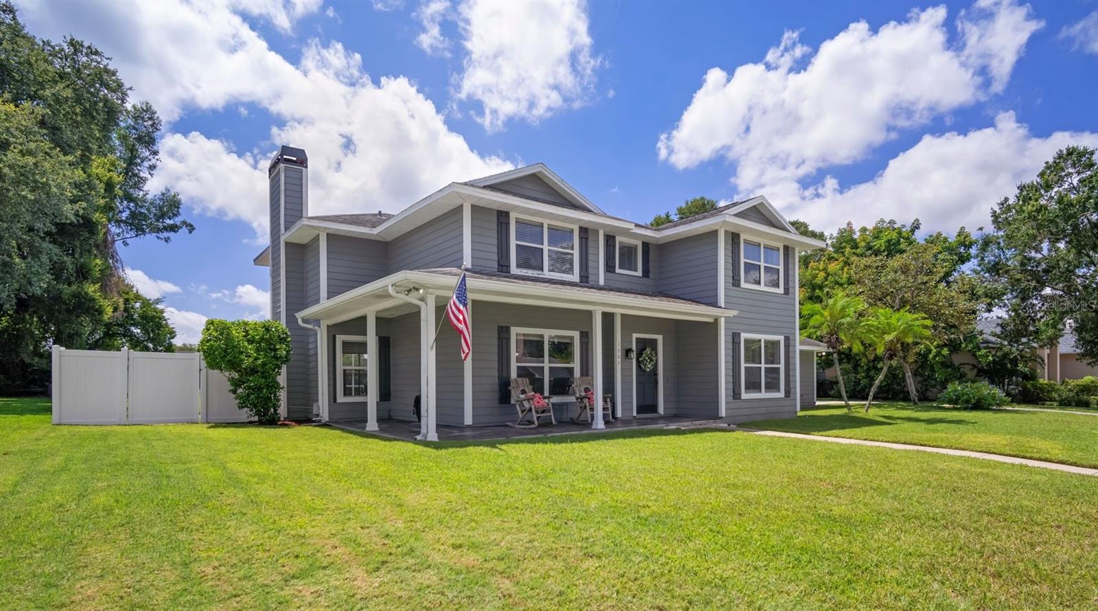 NO HOA- Beautiful POOL & SPA home on a quiet street lined with custom homes on a cul de sac. This charming, well maintained, 2 story welcomes you with its' wrap around porch and side entry garage. Step into the foyer and find a traditional formal living room (perfect for your library or home office) to your left and formal dining to your right. Luxury plank vinyl in all the downstairs rooms makes everything cohesive and inviting. Cheery kitchen has so much space- truly the hub of the home. Granite tops, menu desk, custom back splash and wood cabinets all add to the welcoming feel here. Sit in the breakfast nook and enjoy views of the pool and yard through the large bay window or marvel at the size of the laundry room with added cabinets- actually enjoy doing laundry in this organized space! The family room is another comfortable spot to spend time with loved ones, with it's stone fireplace hearth, wall mounted TV and access to the pool deck through sliding glass doors or the half bathroom. Up the painted stairs you will find the wonderful primary suite with sitting area plus an en suite bathroom with soaking tub and walk in shower. Double sinks and walk in closets make this area of the home both functional and beautiful. 3 more secondary bedrooms (all oversized) are also upstairs and share a full bathroom. Extra outdoor space around the pool & spa might be used for BBQ, football game watching or sunning. Outside of the screen is lush green lawn, fully fenced with plenty of room for a game of catch. No HOA here so storage of boats or toys will work. 2 HVACS recently replaced, new hot water heater in 2024- pride of ownership shows. Schools are top notch (Brooker, Burns and Bloomingdale HS) and the location is in the middle of everything. Literally be at the grocery store inside of 5 minutes. Eateries, grocery and retail- mall, I-75 or crosstown- all very easy to get to. It's good to be home!
