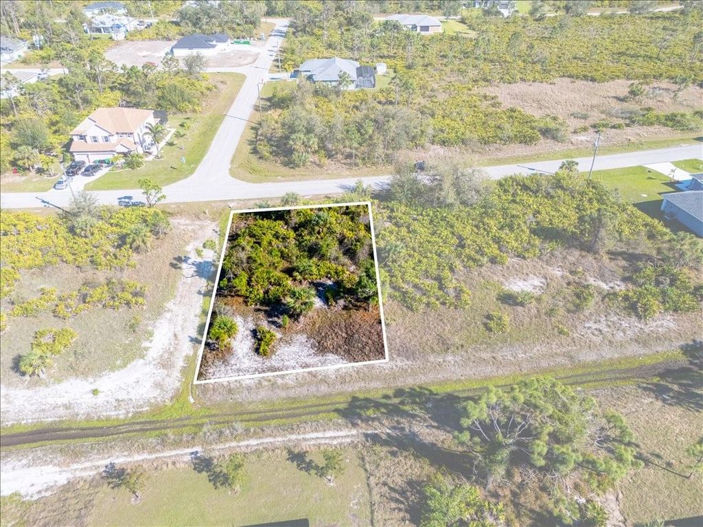 Photo of 9243 Waldrep Street, Port Charlotte, FL 33981 (MLS # C7520417)