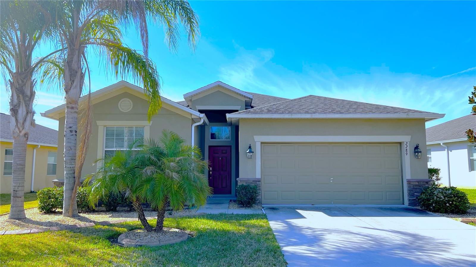 WELCOME HOME! This outstanding single-family residence is located within an award-wining residential community. The home features an open-concept layout comprising four bedrooms and three bathrooms. It offers a combined family, dining, and kitchen space designed for modern living, along with energy-efficient upgrades such as dual-paned windows, high ceilings, and custom ceiling fans. At the heart of the home is a spacious kitchen equipped with upgraded maple cabinetry, high-end granite countertops, a large center island, and a generous pantry for storage. The primary suite includes an expansive bathroom with two walk-in closets, a garden bathtub, a separate walk-in shower, and dual vanities with granite surfaces matching the kitchen. The second guest bedroom features a private en-suite bathroom, while the third and fourth bedrooms share a Jack-and-Jill bathroom. Additional conveniences include a dedicated laundry area with washer and dryer, a covered rear patio suitable for outdoor activities, and a sizeable backyard retention area with NO Back Neighbors. The interior has been freshly painted throughout. Residents enjoy access to an award-winning community recognized for its design and amenities, including two resort-style pools, a fully equipped gym, tennis courts, dog parks, playgrounds, walking trails, and an on-site restaurant. An 18-hole professional golf course designed by Michael Dasher is also available. The property is conveniently situated near grocery stores, schools, and major highways with easy access to Orlando. Early application is encouraged for interested parties. Applicant criteria:
1) Credit score: 600+; 2) Household monthly income: 3 times the monthly rent ($2,350 *3 = $7,050 Monthly); 3) No eviction or bankruptcy history; and 4) Only small pets allowed. Homeowners pay HOA fee. Tenants take care of lawn and pest control. Renter’s insurance is required before move-in.