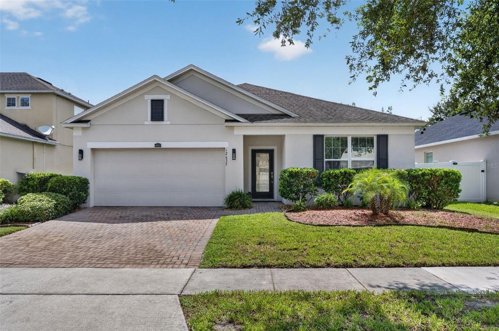 Photo of 12637 Old Plantation Lane, Orlando, FL 32824 (MLS # O6427236)