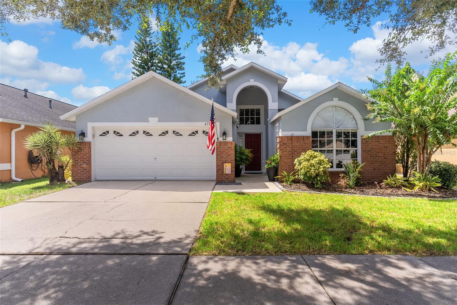 Welcome to your new home in the highly sought-after Lake St. Charles community in Riverview! This charming 3-bedroom, 2-bathroom residence sits on a peaceful pond-front lot, offering relaxing water views right from your hot tub in your backyard. Inside, you’ll love the soaring high ceilings and the open-concept layout that seamlessly connects the formal dining, living, and kitchen areas—perfect for entertaining or family gatherings. The split-bedroom floor plan provides privacy, with a spacious primary suite tucked away from the secondary bedrooms. Enjoy peace of mind with a new roof installed in April and an A/C just 4 years new. Lake St. Charles is a premier community featuring a clubhouse, pool, walking trails, dog park, playgrounds, and more—all just minutes from shopping, dining, and major highways. Don’t miss the opportunity to make this beautiful pond-front home yours!