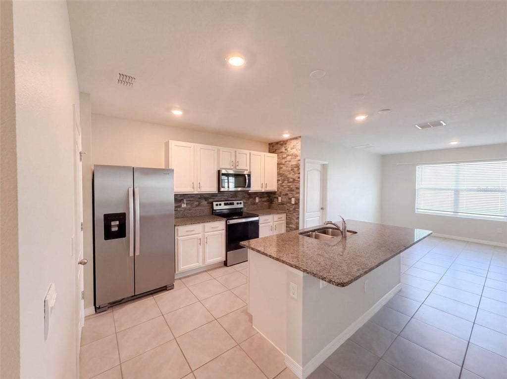 Photo of 2112 Elio Ridge Drive, Zellwood, FL 32798 (MLS # O6441507)