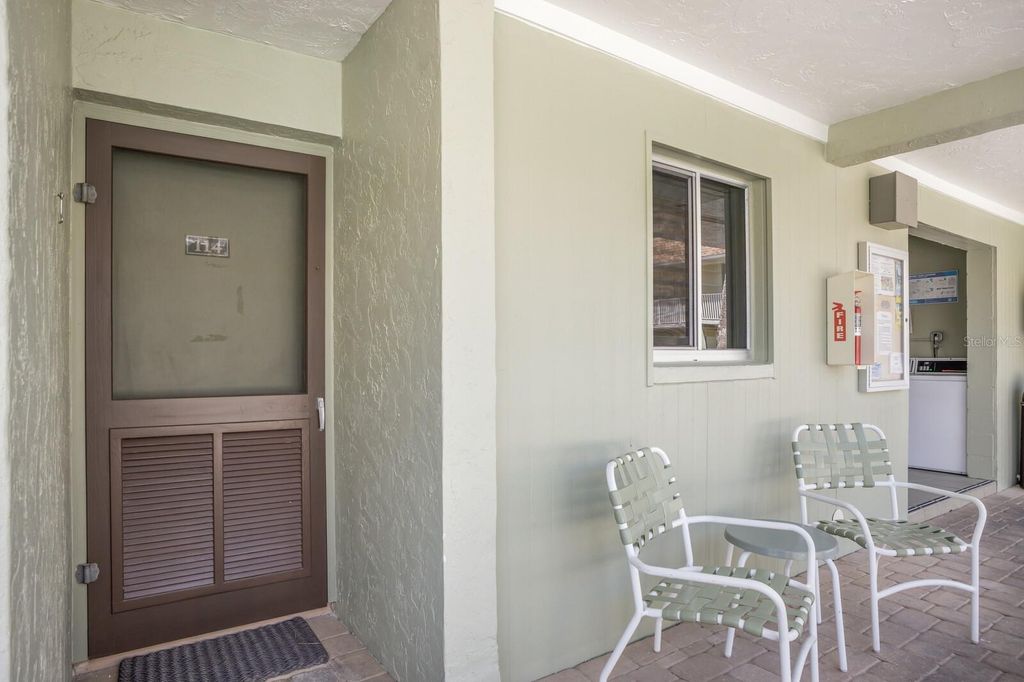 Photo of 7100 Gulf Drive #114, Holmes Beach, FL 34217 (MLS # A4651249)