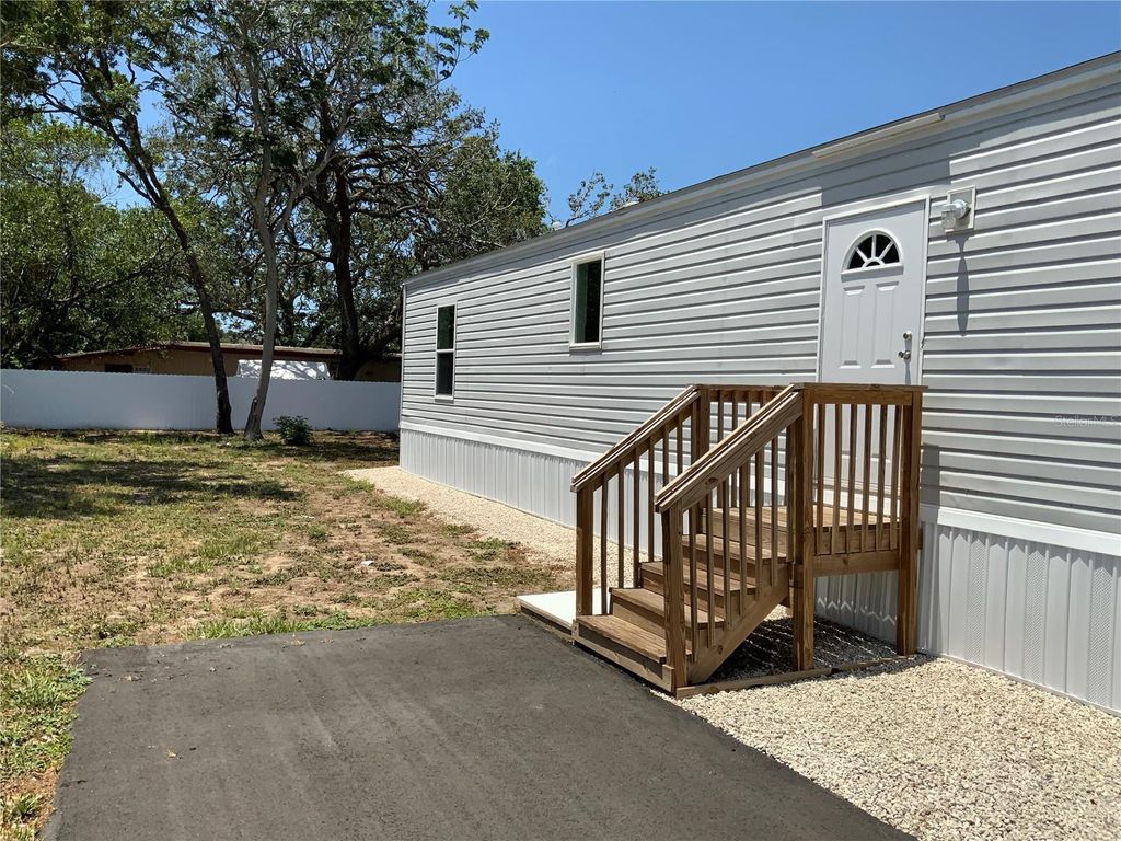 Photo of 11351 Edison Avenue, New Port Richey, FL 34654 (MLS # TB8382883)