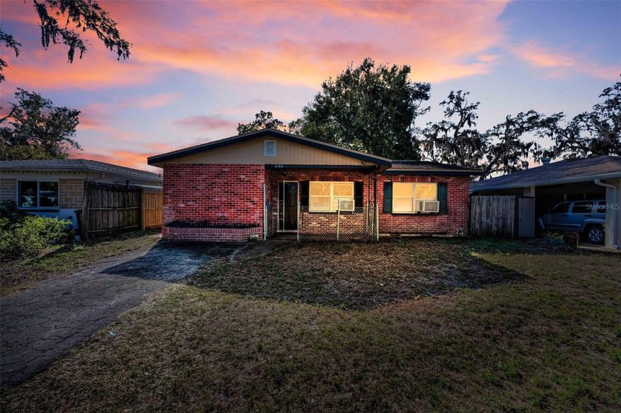 Located in a desirable non-flood zone and within walking or golf-cart distance to schools, boat ramps, parks, hospitals, and New Port Richey’s eclectic shops and restaurants, this well-loved and welcoming home is truly a rare gem.
This fenced 3-bedroom, 2-bath pool home also features an added efficiency/mother-in-law suite with a full bath, offering flexible living options for guests, extended family, or home office use. With nearly 1,600 square feet of living space, there’s room for everyone to spread out and feel at home.
Enjoy cooking and entertaining in the large, bright kitchen and dining area, both offering beautiful views of the screened-in pool and pan-roof lanai—perfect for Florida living. In the cooler months, cozy up in the family room beside the wood-burning wrought iron fireplace, adding warmth and charm.
Recent updates enhance both comfort and value, including two fully renovated bathrooms, a large screened-in pool, easy-to-clean newer windows, new tile flooring throughout, fresh interior paint, and a fenced dog run, along with many thoughtful touches throughout the home.